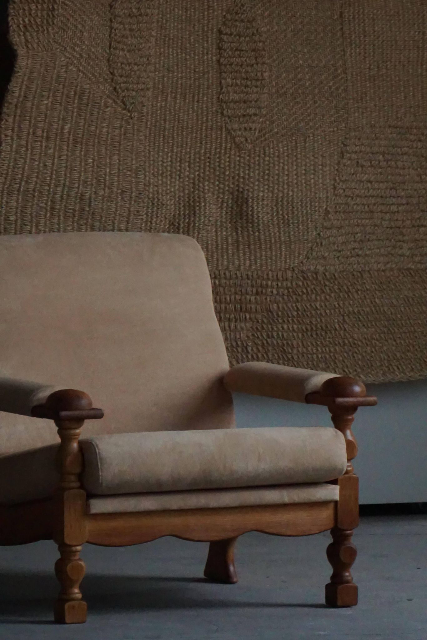 Mid-20th century, pair of armchairs by Henning Kjærnulf, oak and alcantara, 1960s.