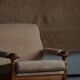 Mid-20th century, pair of armchairs by Henning Kjærnulf, oak and alcantara, 1960s.