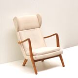 Danish design vintage armchair with cream upholstery from the 70s