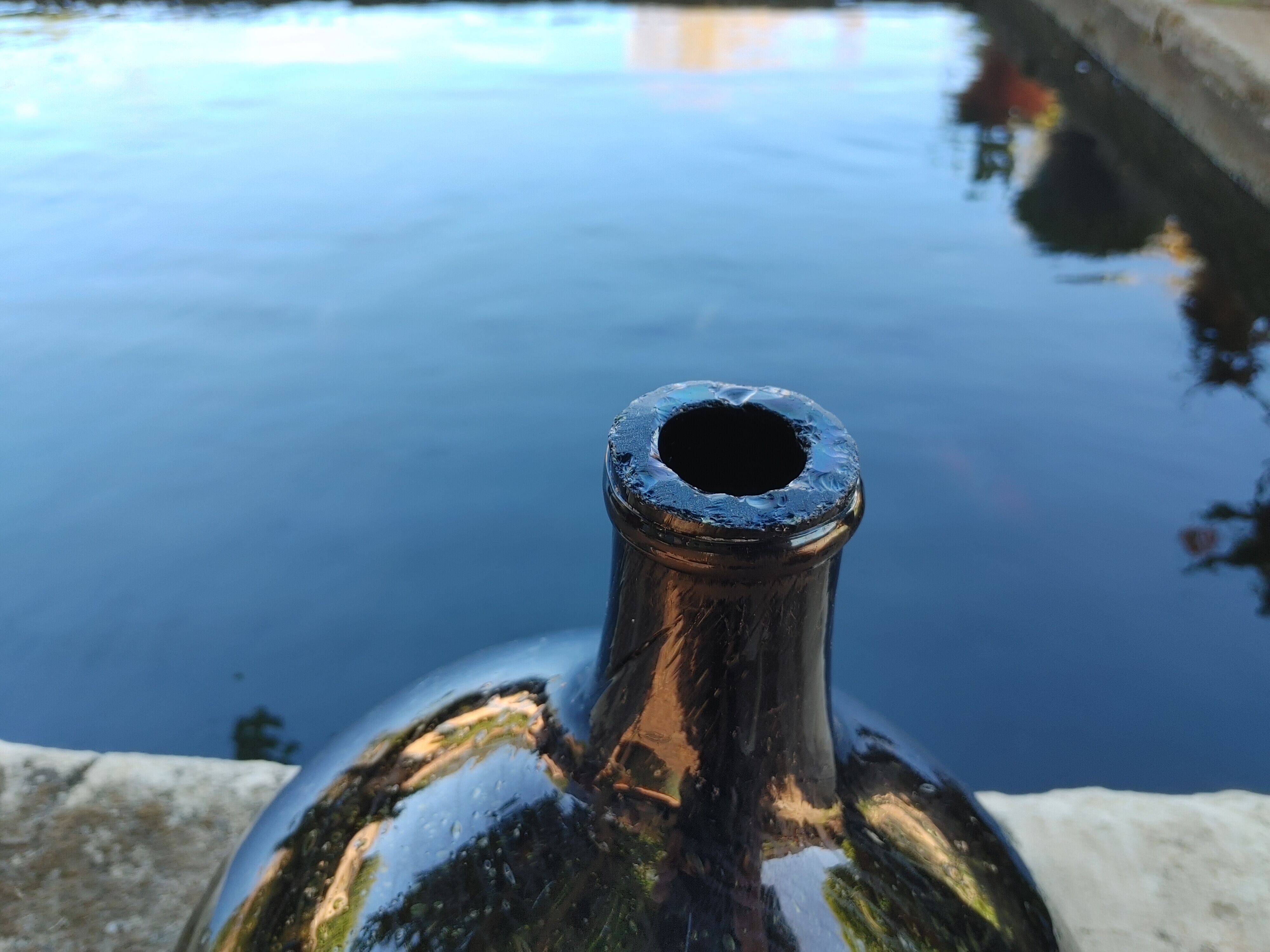 Old demijohn, 19th century bubbled glass