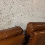Paire fauteuils cuir camel