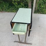Folding and extending kitchen table in steel and aqua green wood