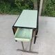 Folding and extending kitchen table in steel and aqua green wood