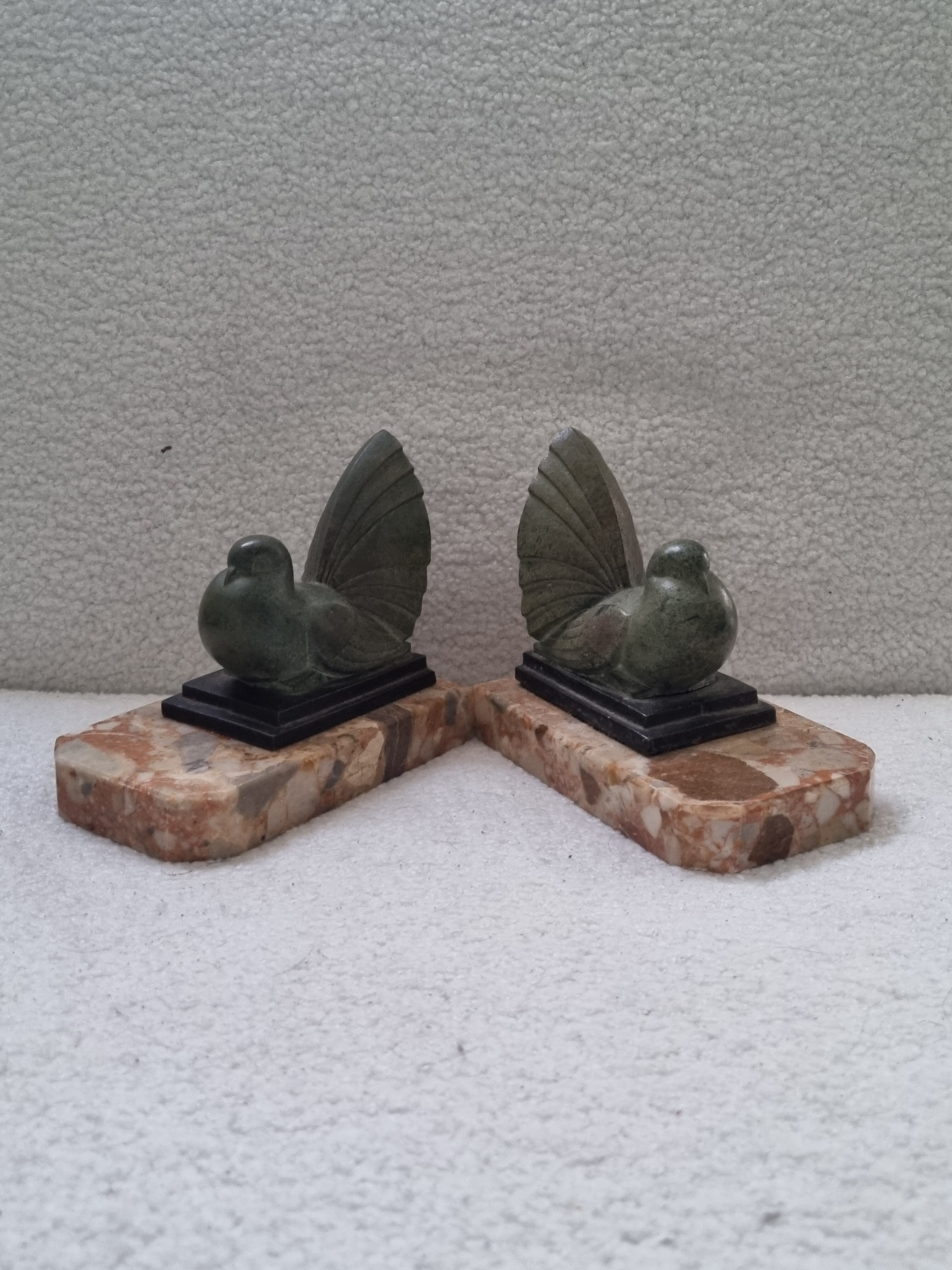 Pair of greenhouse book Art Deco animal sculpture marble base