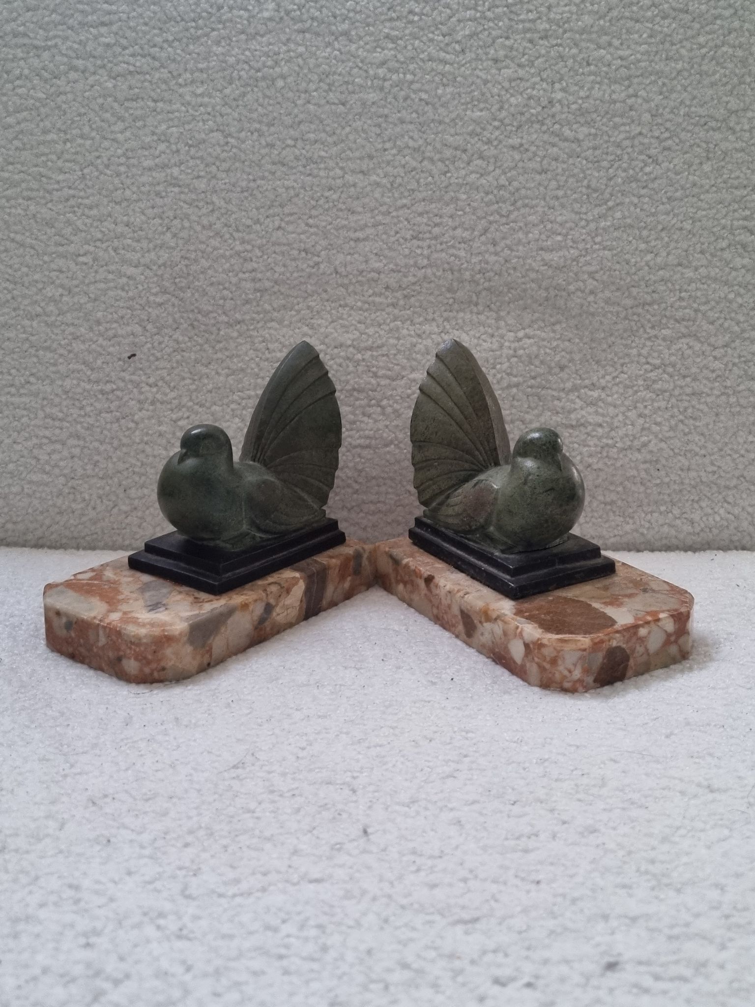Pair of greenhouse book Art Deco animal sculpture marble base