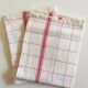 Pair of cloths of linen tiles alumni window