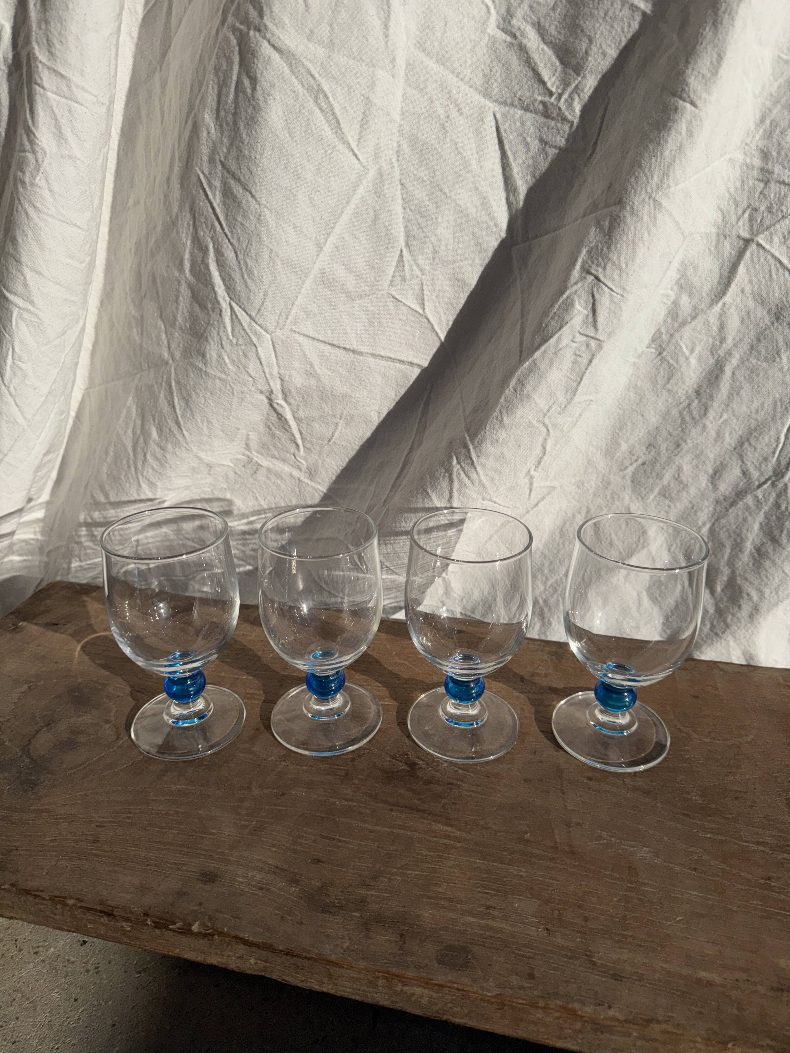 Set of 4 blue ball stemmed water glasses