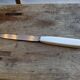 Set of 10 vintage stainless steel and bakelite table knives