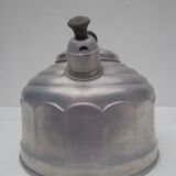 old aluminum kettle with a sufffloating system