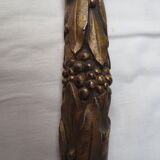 old bronze curved pediment