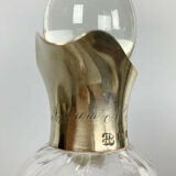 Blown glass carafe with silver frame