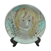Plate with the portrait of a woman signed Marie Madeleine Jolly at Vallauris