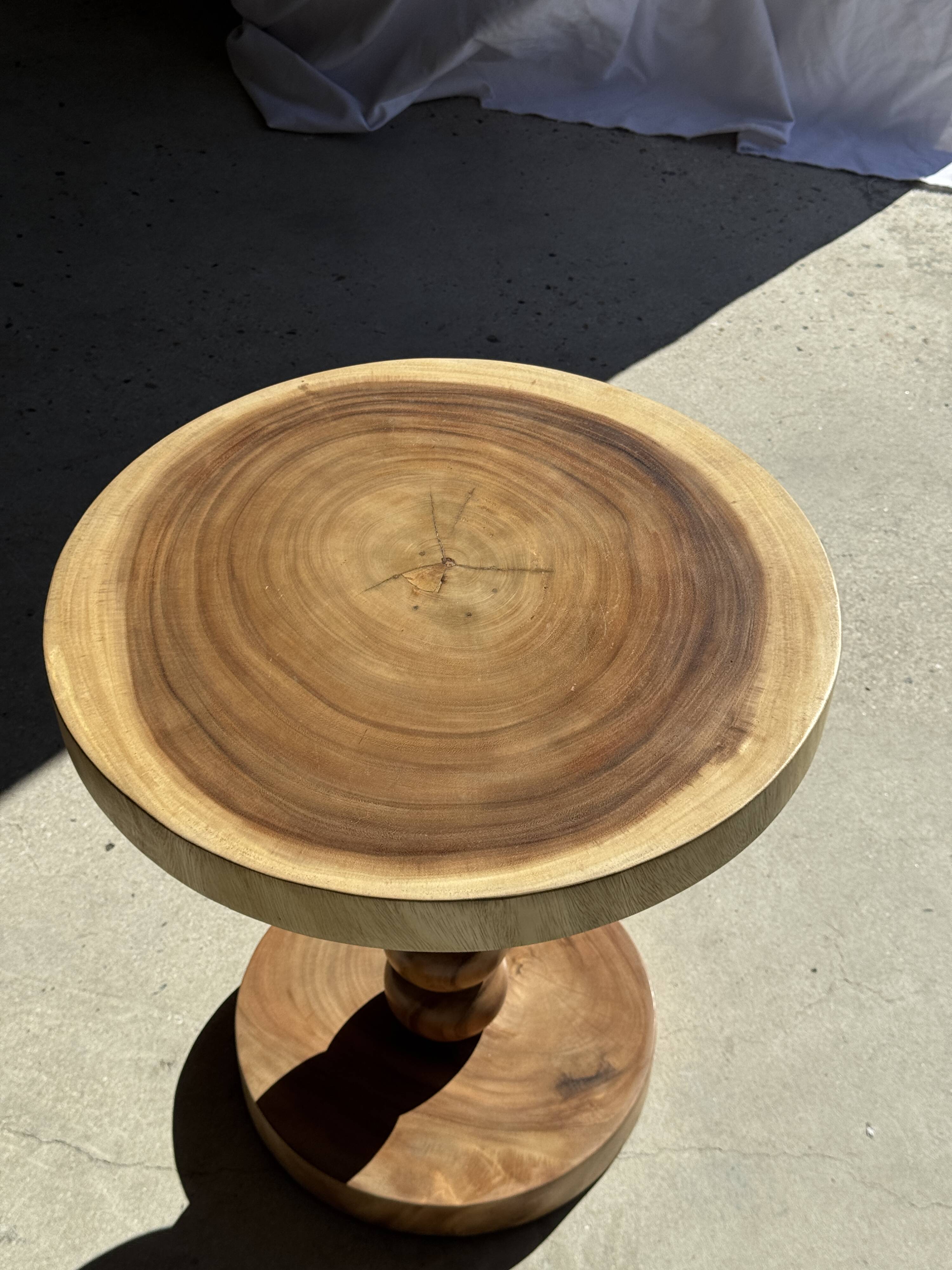 Coffee table in solid suar with central leg and spheres H56.5 D55.5
