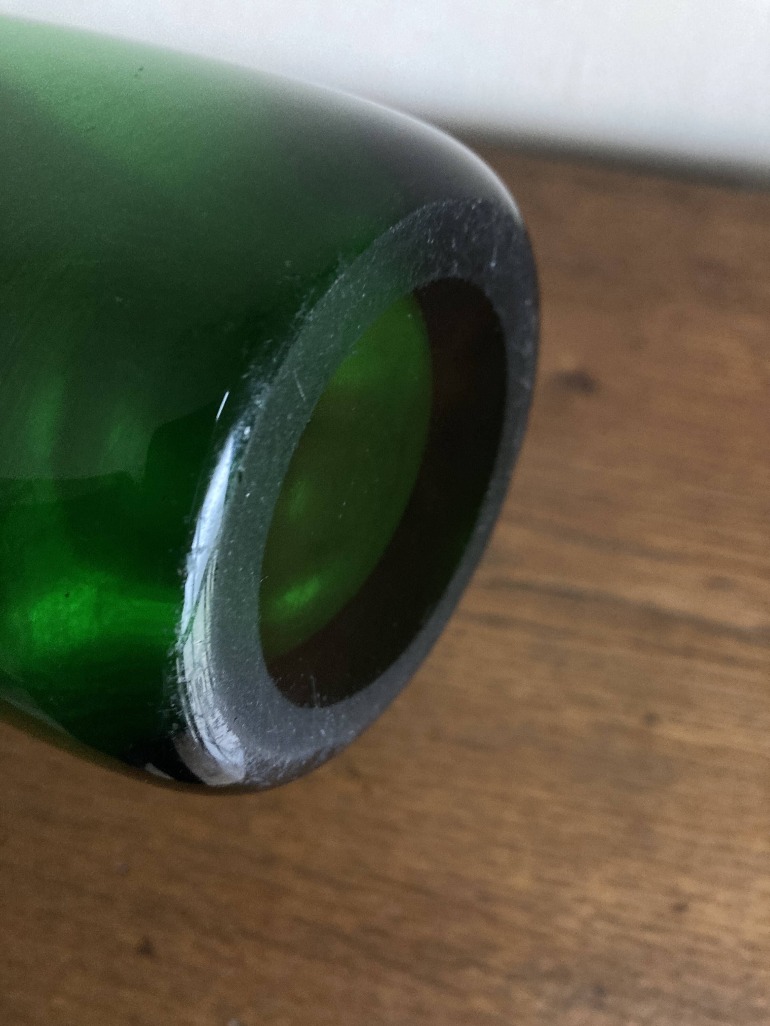 1950s Médicis vase, large Art Deco with handles, made of green blown glass.