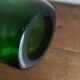 1950s Médicis vase, large Art Deco with handles, made of green blown glass.