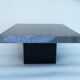 Square pedestal coffee table with mirror top