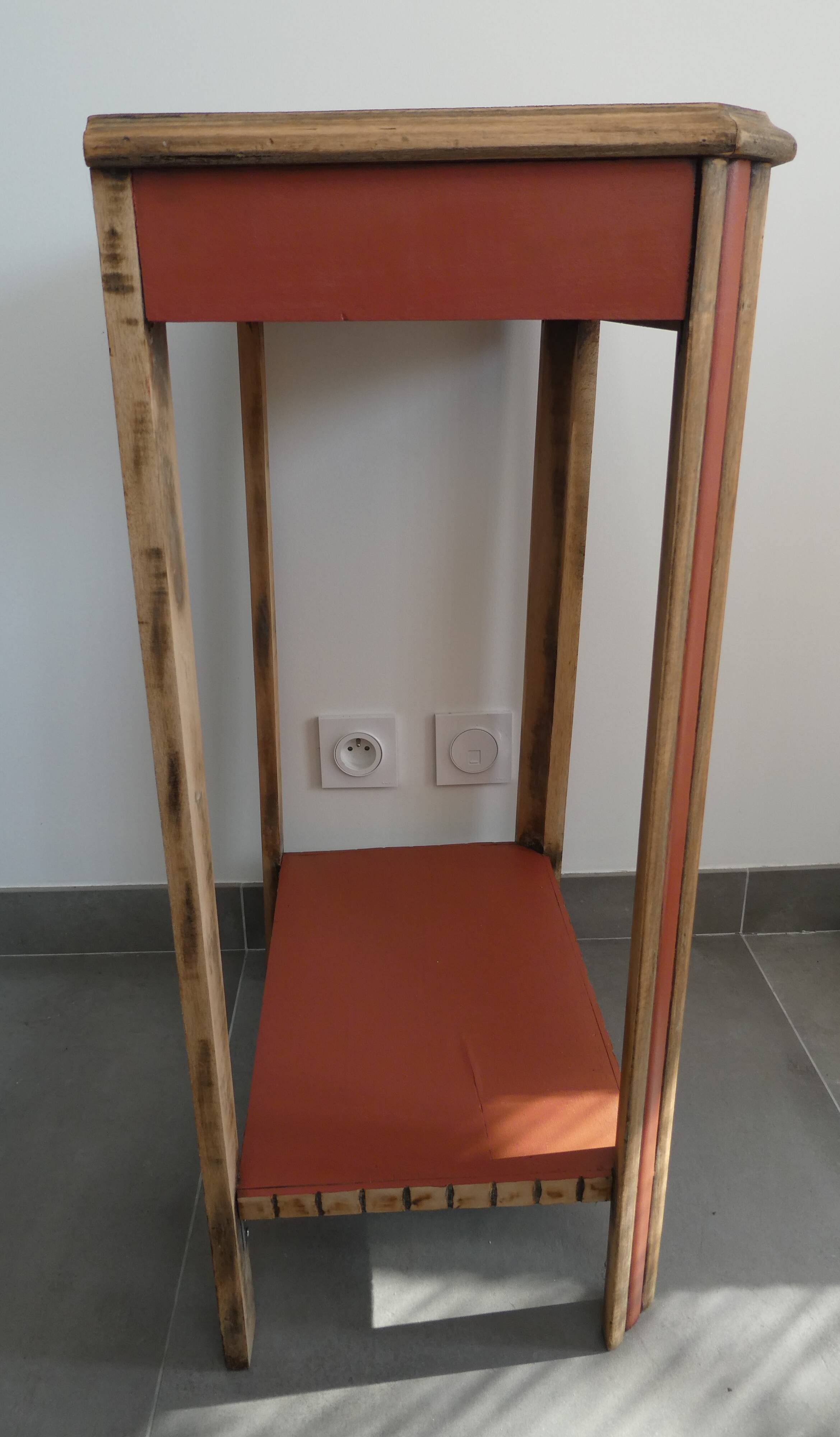 Console, small red accent table.