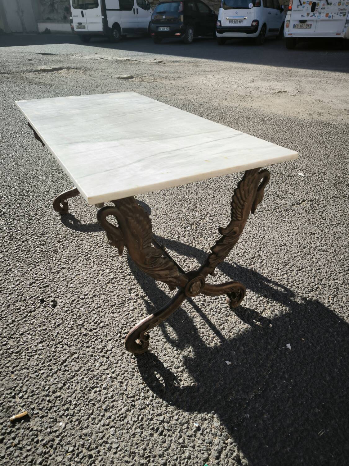 Cast iron and marble swan-neck coffee table