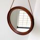 Mid Century solid teak wall mirror with a leather strap - Danish design