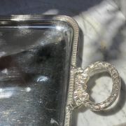 Silver-plated service tray in the Louis XVI style.