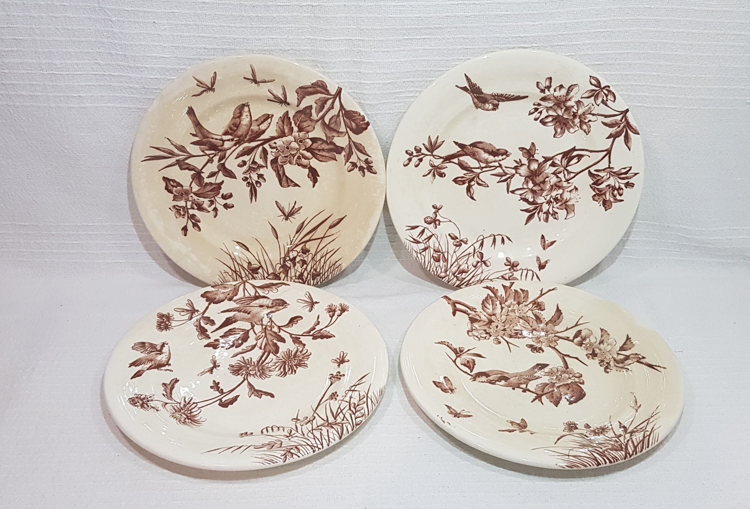 Set of 4 flat plates in Clairfontaine earthenware model Flowers, iron earth