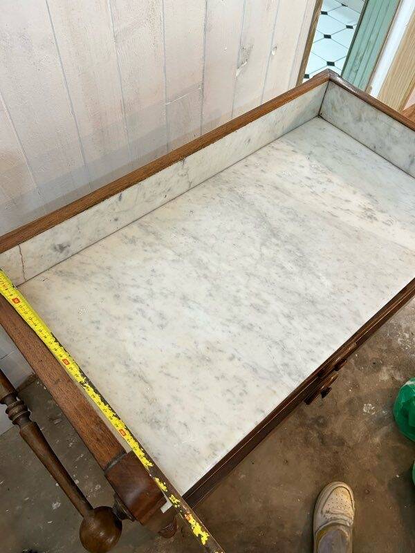 Beautiful antique furniture in marble and wood.