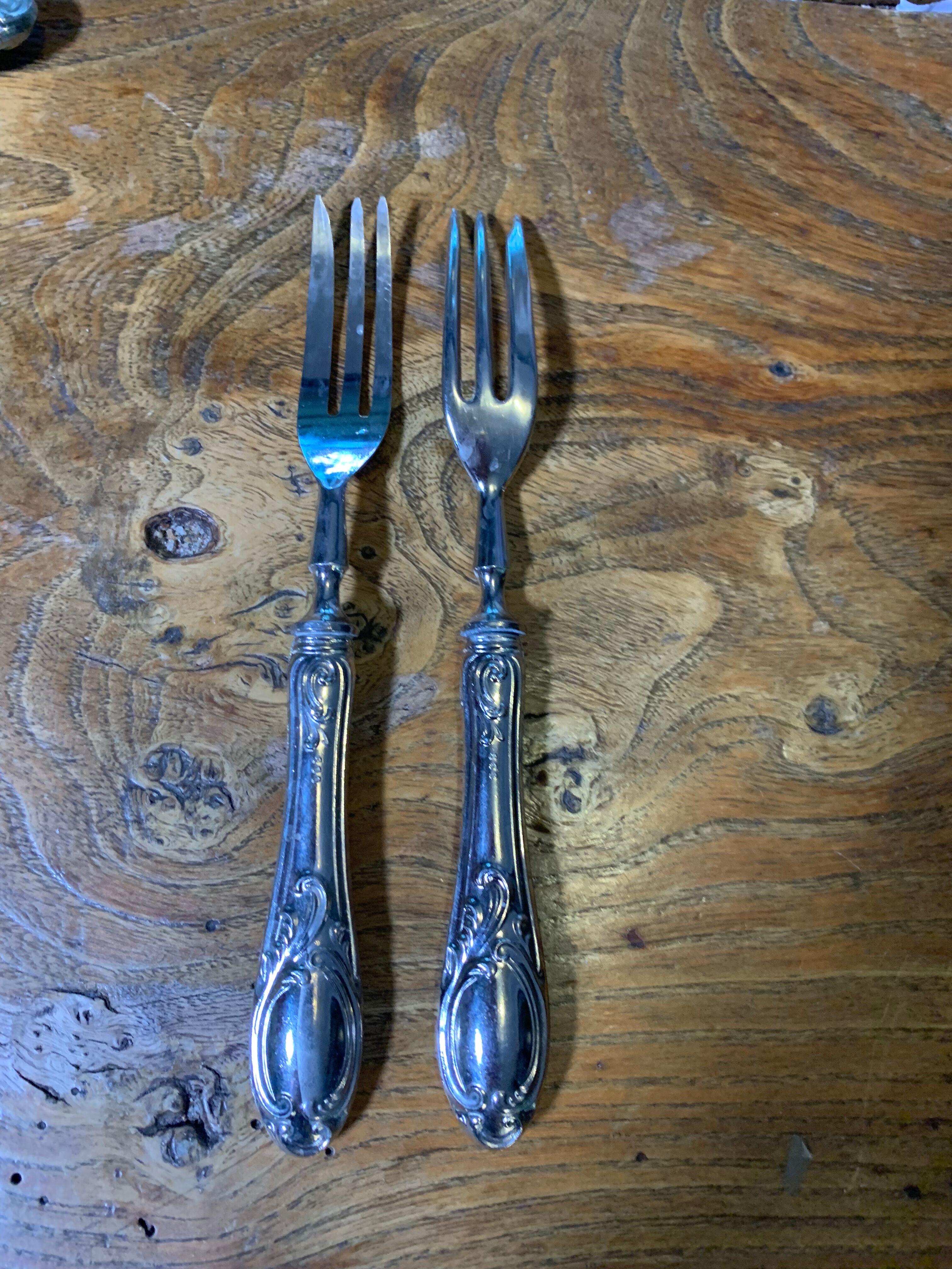 Service de couverts à dessert composé de 11 pièces poinçon 800 ouvragées anciens et collector