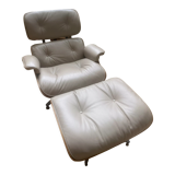 Armchair and footrest by Charles & Ray Eames