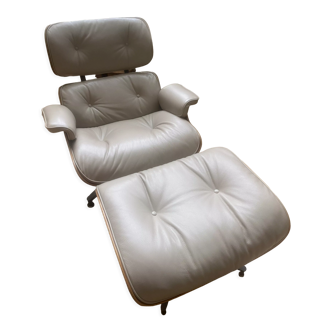 Armchair and footrest by Charles & Ray Eames