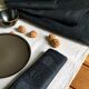Set of four old damasked towels tinted black