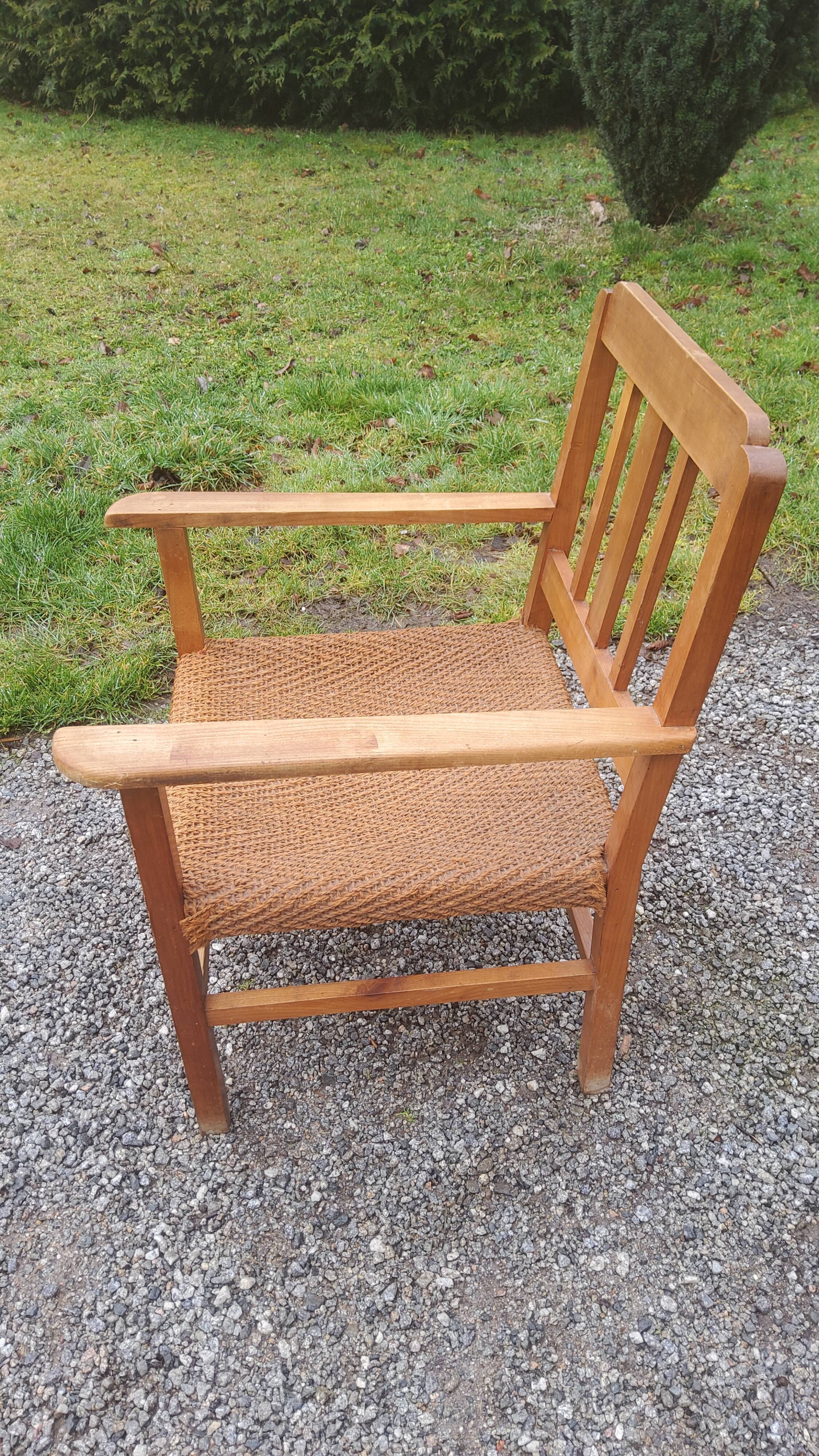 Scandinavian armchair of the 50s in cherry tree sitting in rope