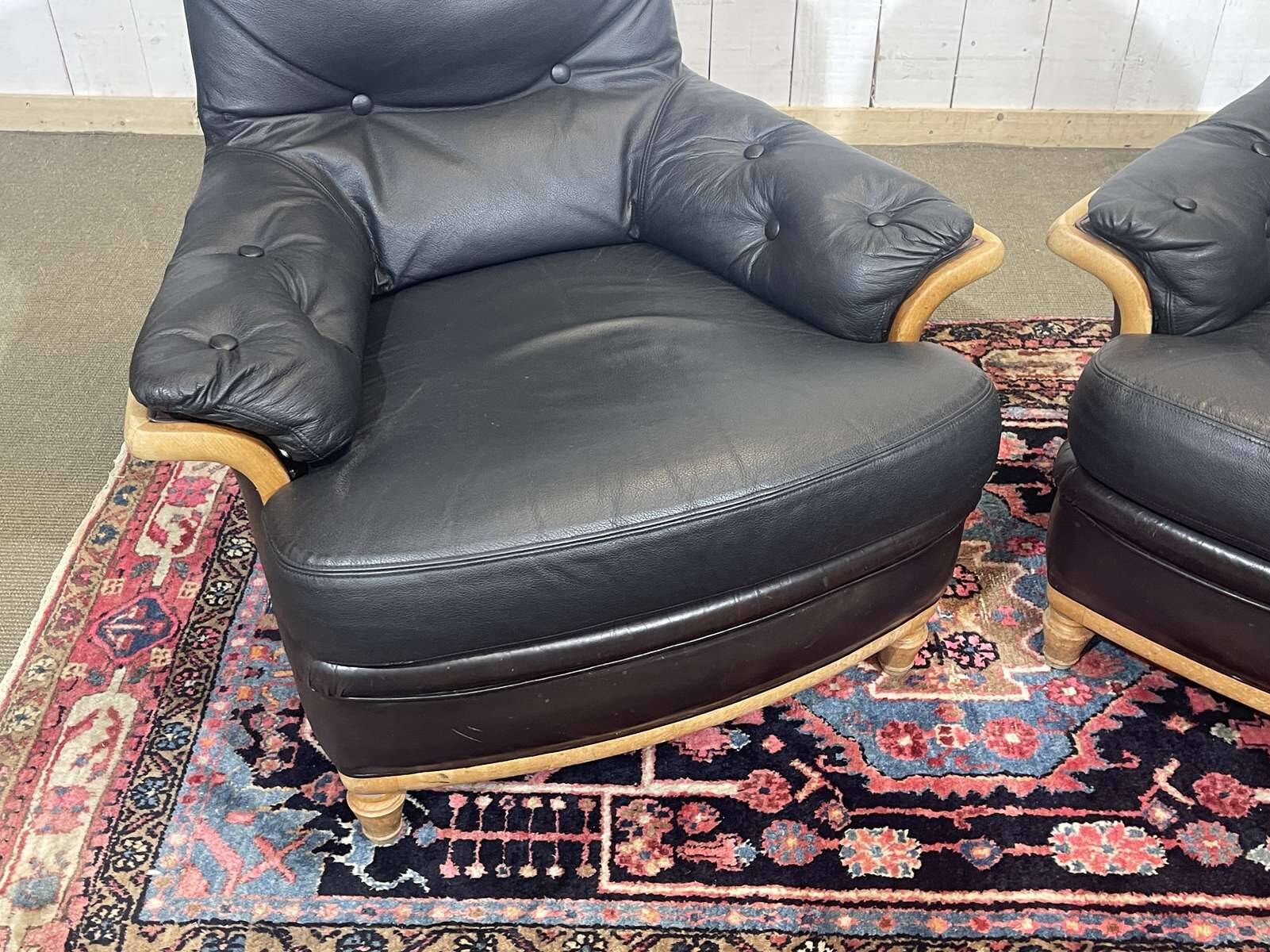 Pair of leather and beech armchairs from the 1970s.