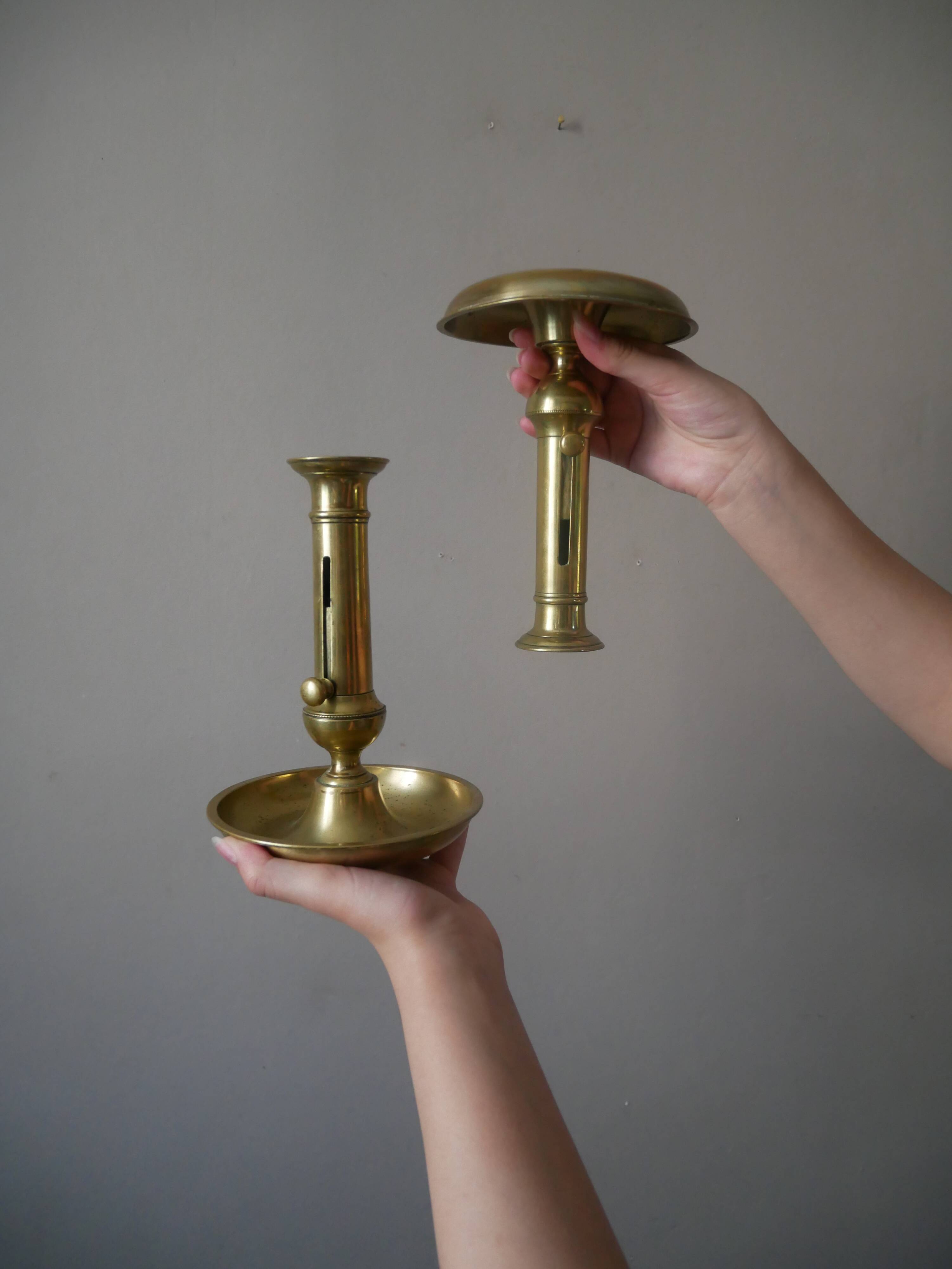 Pair of brass push-button candlestick holders in gold metal, bohemian country decoration