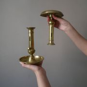 Pair of brass push-button candlestick holders in gold metal, bohemian country decoration