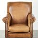 Fauteuil en cuir de vachette au look anglais caractéristique