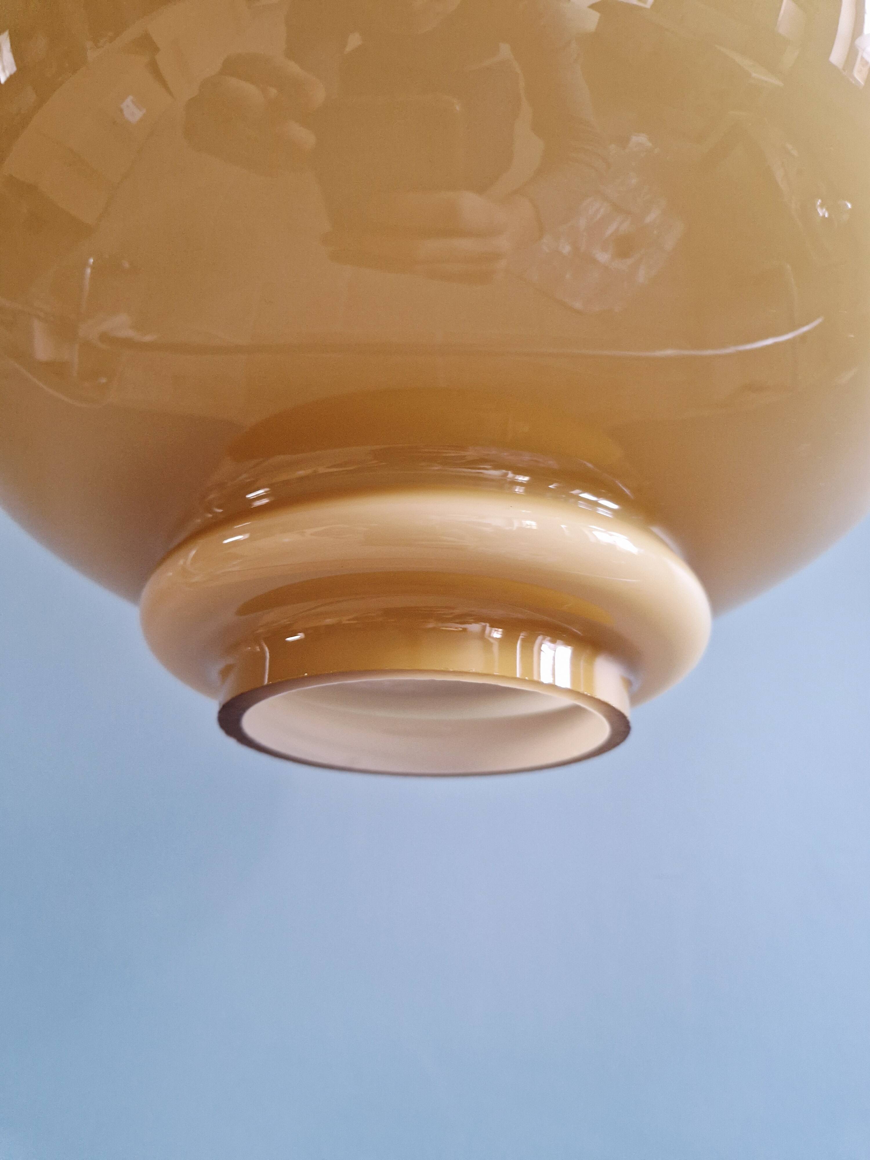 Scandinavian suspension light in mustard opaline, H-A Jakobsson, 1970.