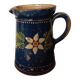 Antique earthenware milk jug