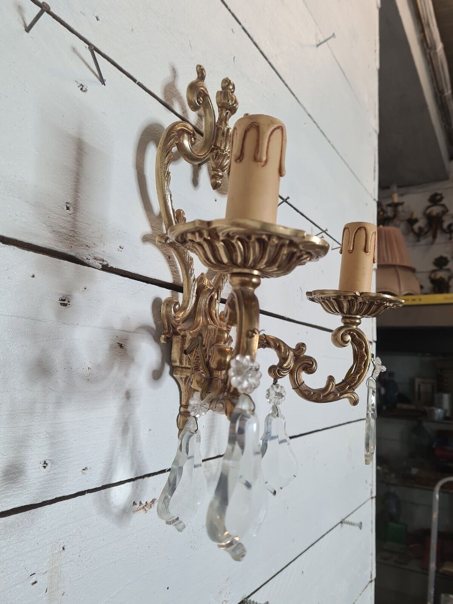 Louis XV style bronze wall lamp with tassels