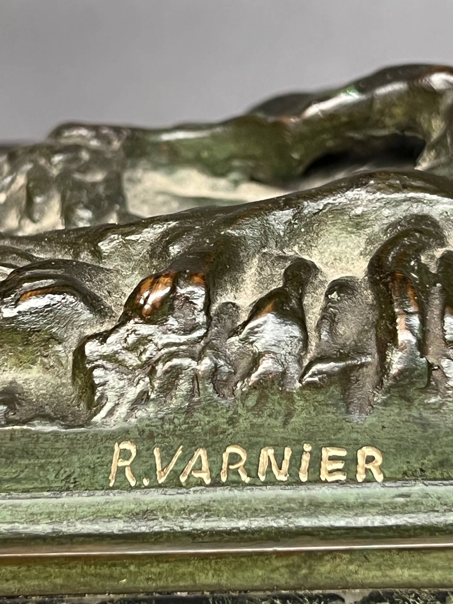 Rene Andre Varnier. Bronze figure of a pheasant on a green marble base.