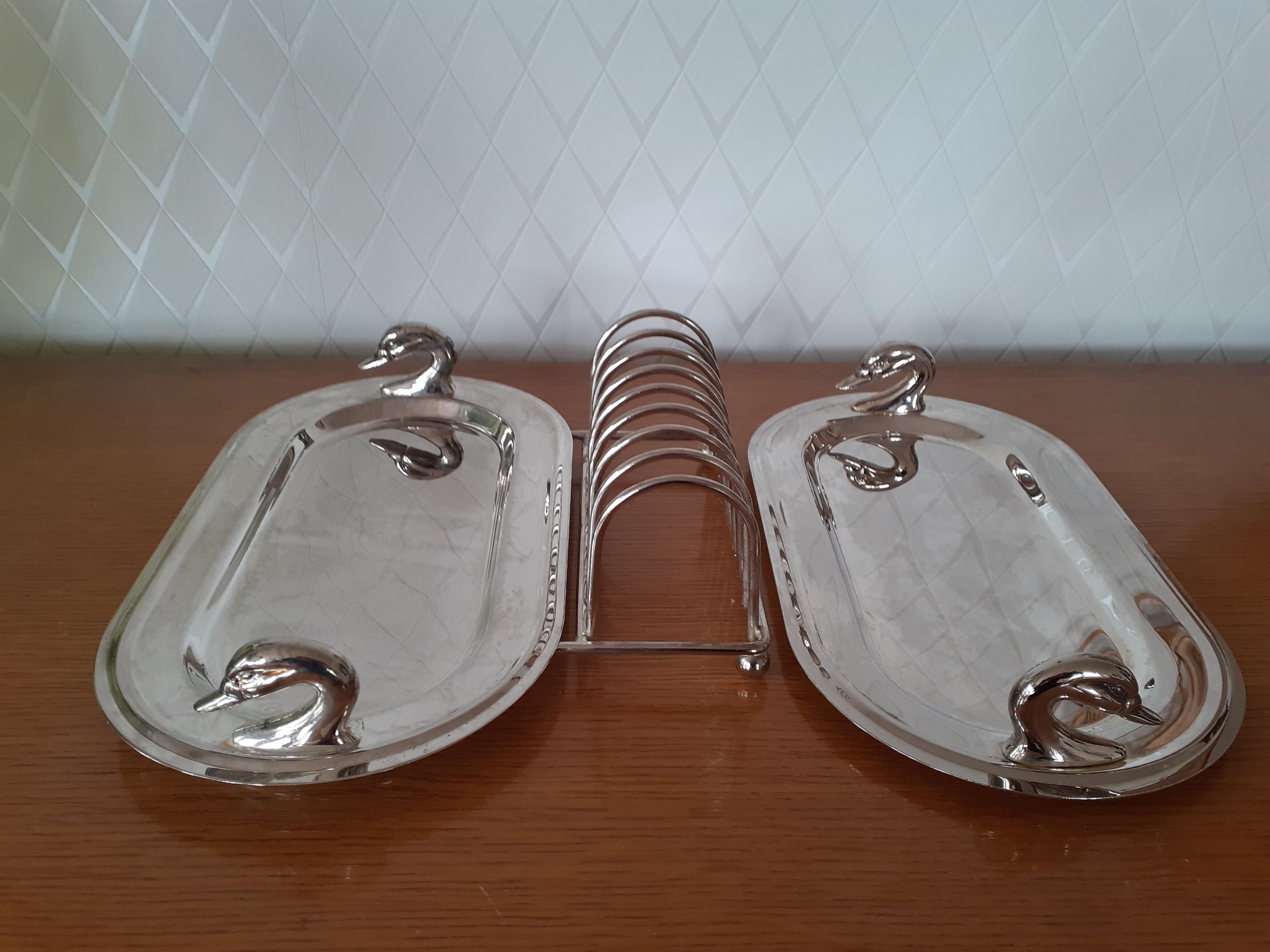 Two foie gras dishes and their toast holder