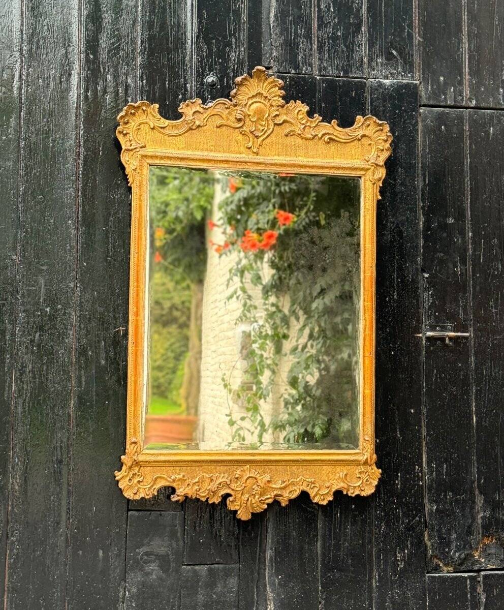 Baroque mirror in carved, stuccoed and gilded wood, Vienna circa 1700
