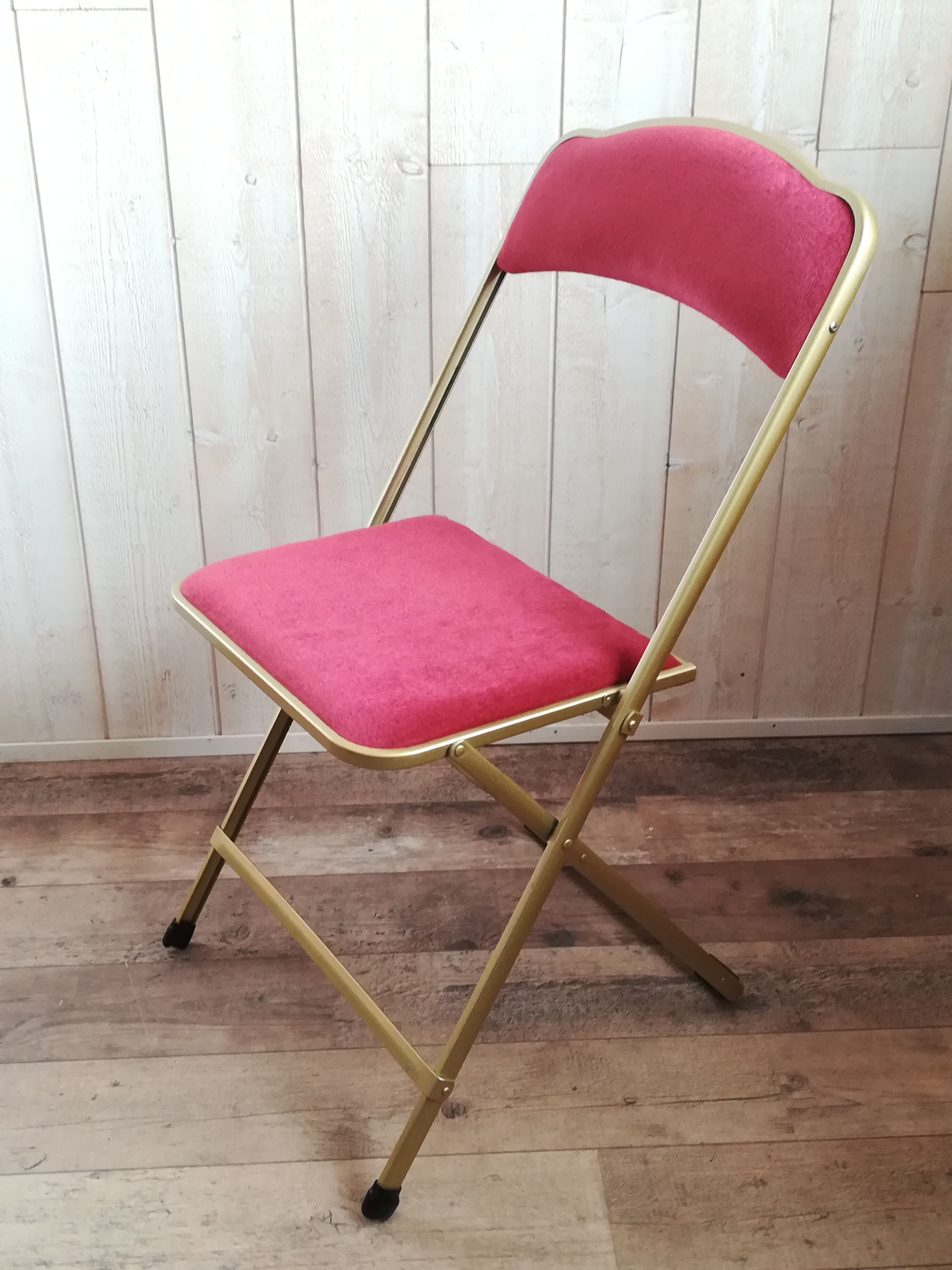 Pink velvet folding chair