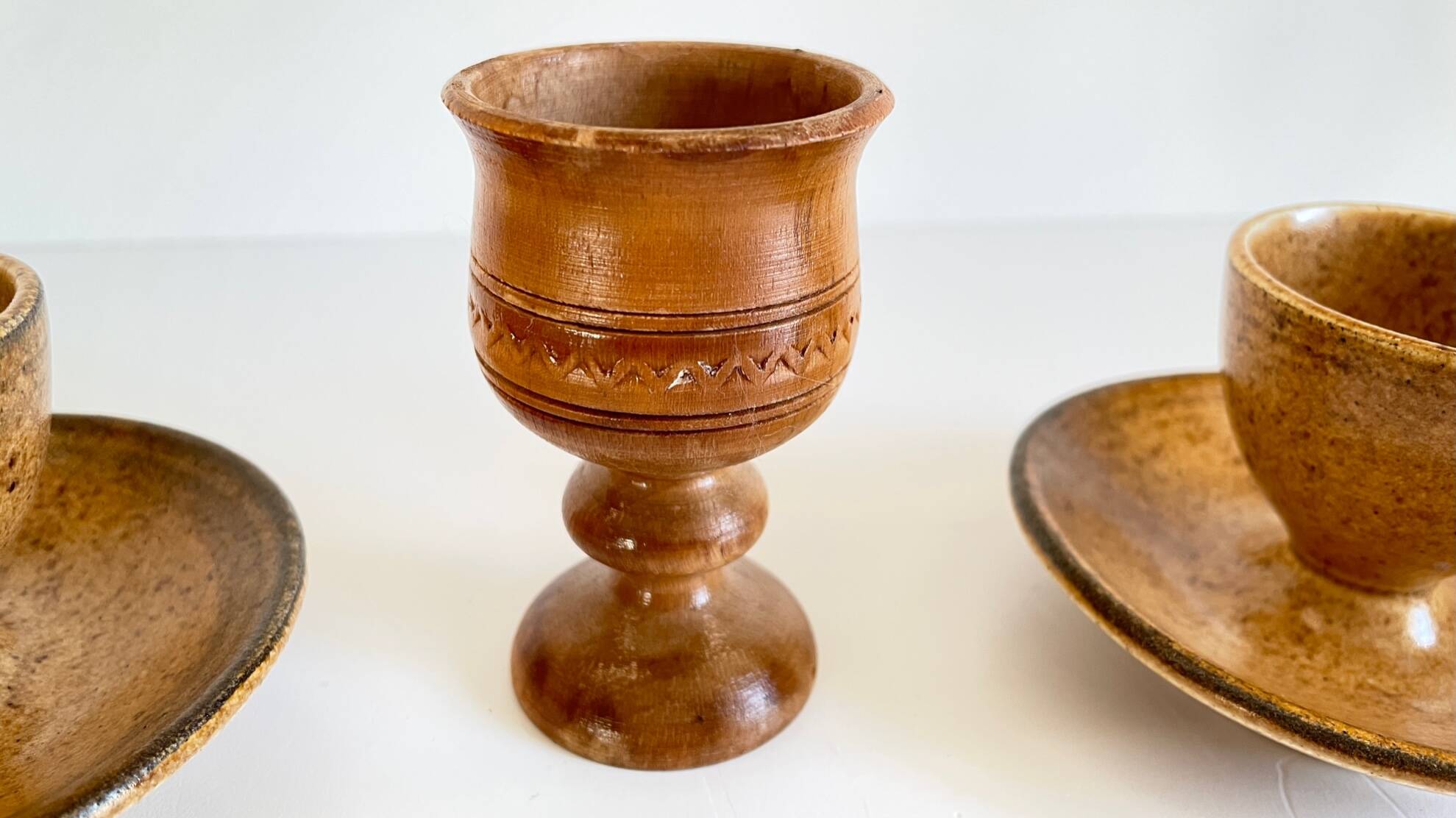 Trio of vintage ceramic and wood egg cups