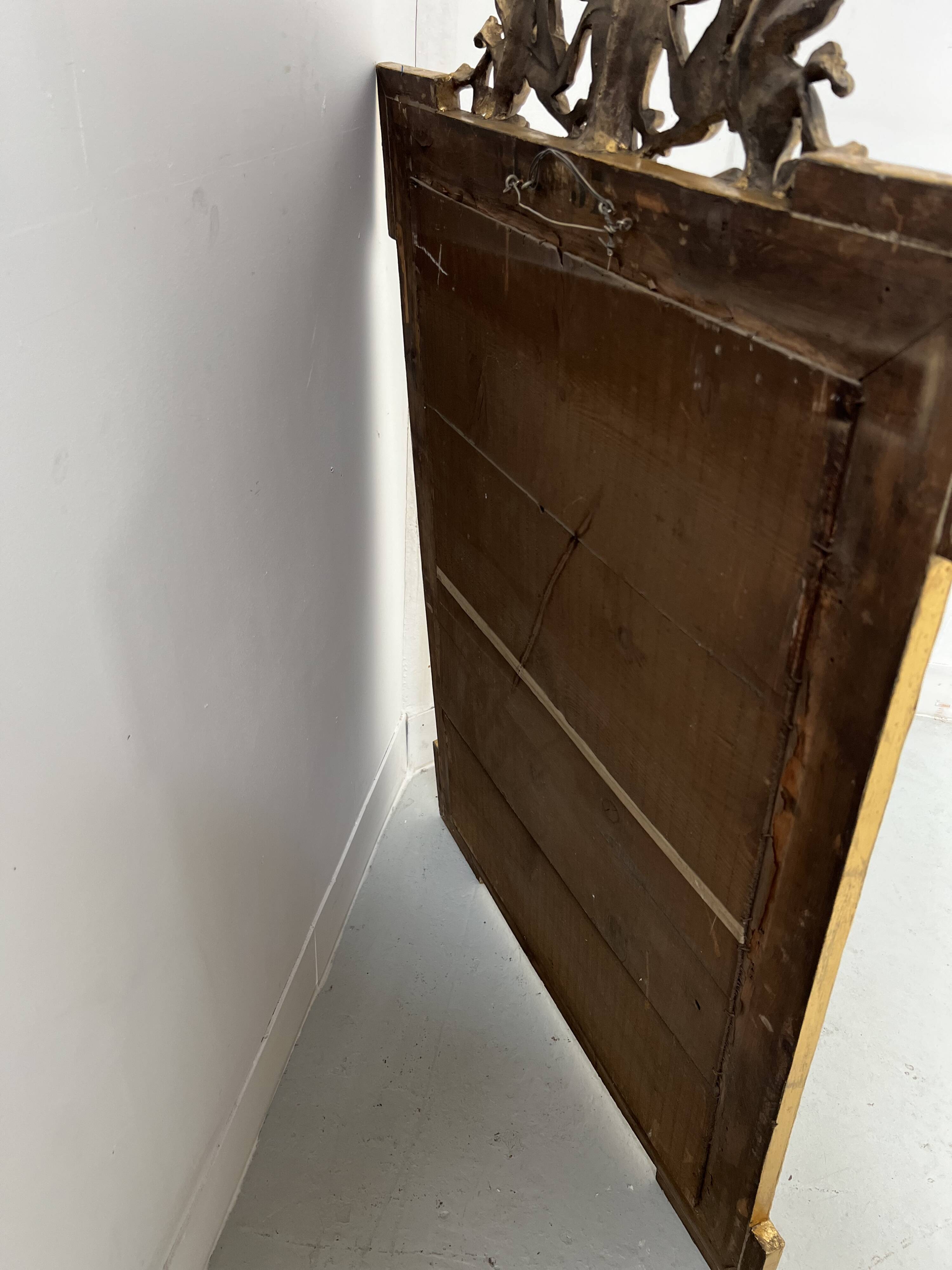 Louis XVI style mirror in wood and gilded stucco, 19th century