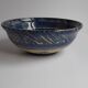 Blue enamelled terracotta cup