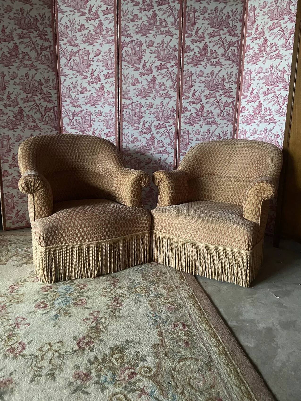 Pair of renovated upholstered frog chairs in beige velvet.