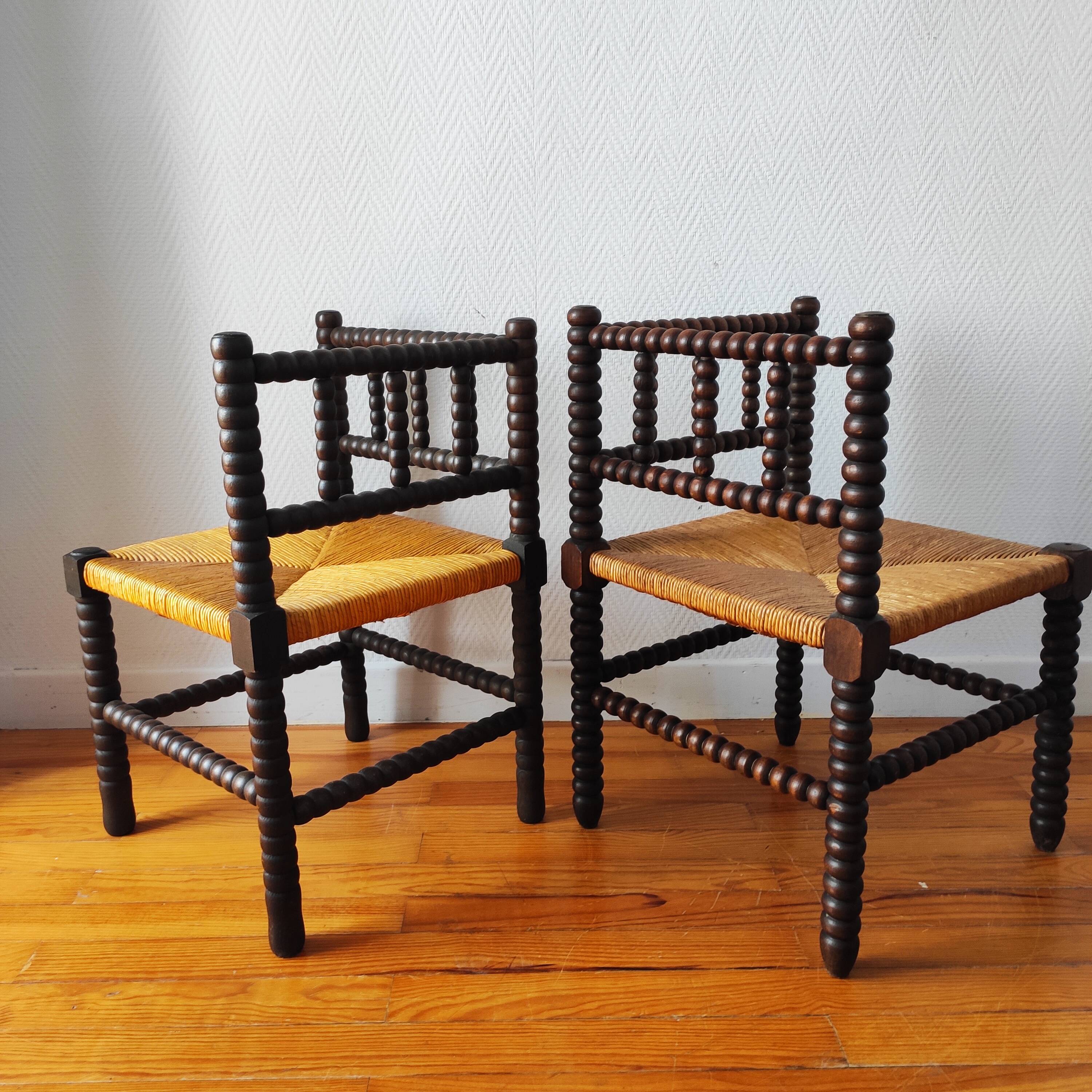 Pair of French corner chairs - turned wood, mid-20th century.