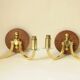 Pair of vintage wall sconces in polished gold brass, wood and glass