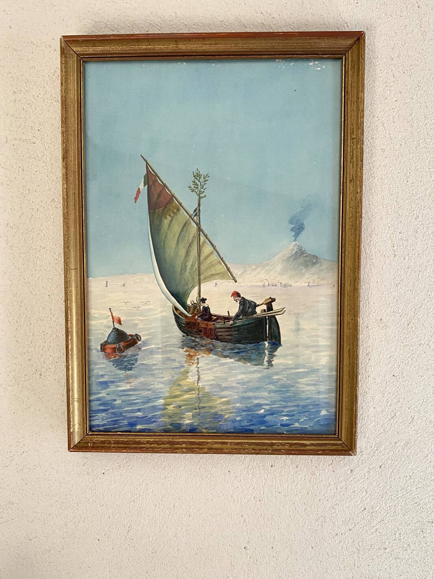 Painting "Sicilian Fishermen" framed under glass.