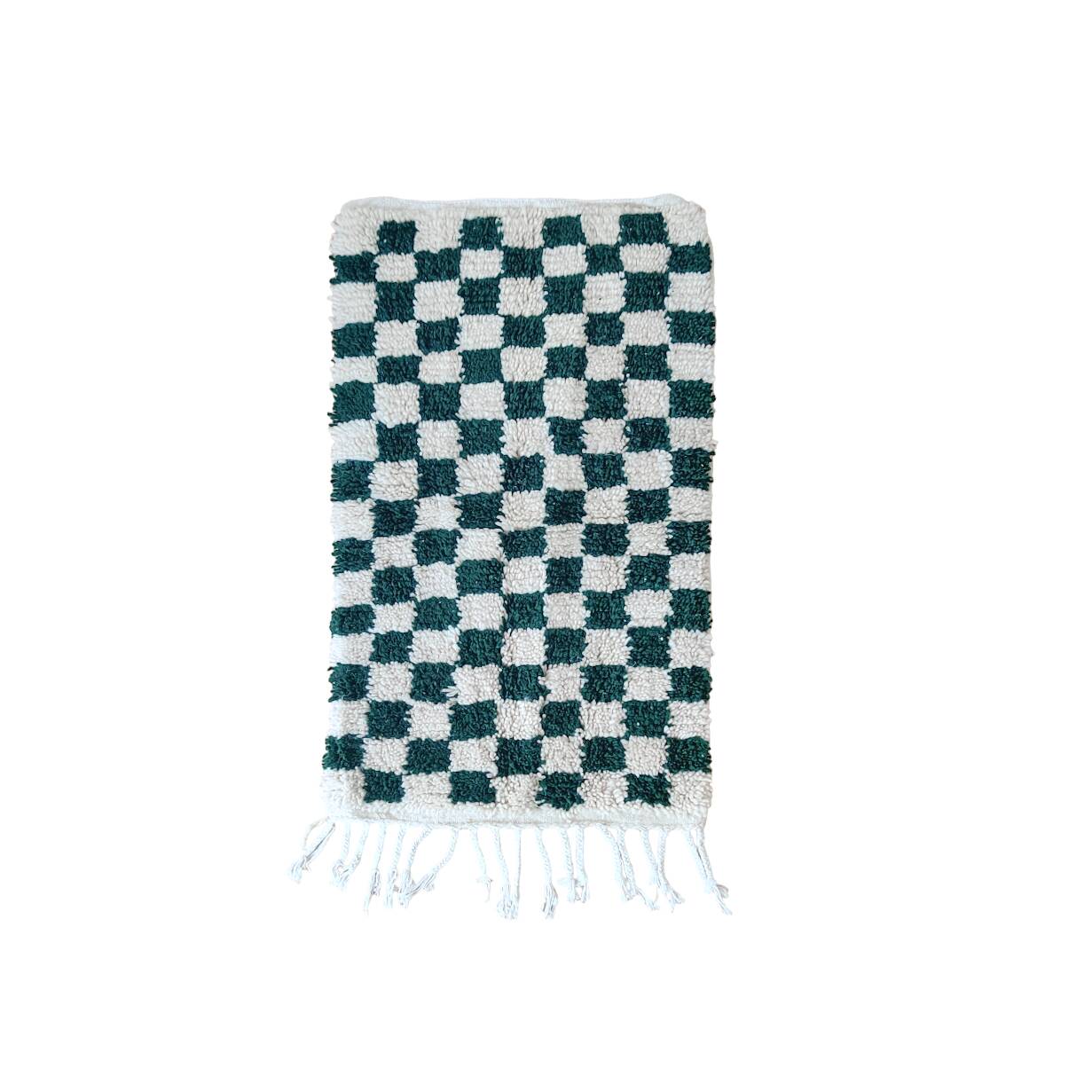 Small Berber rug with green tiles.